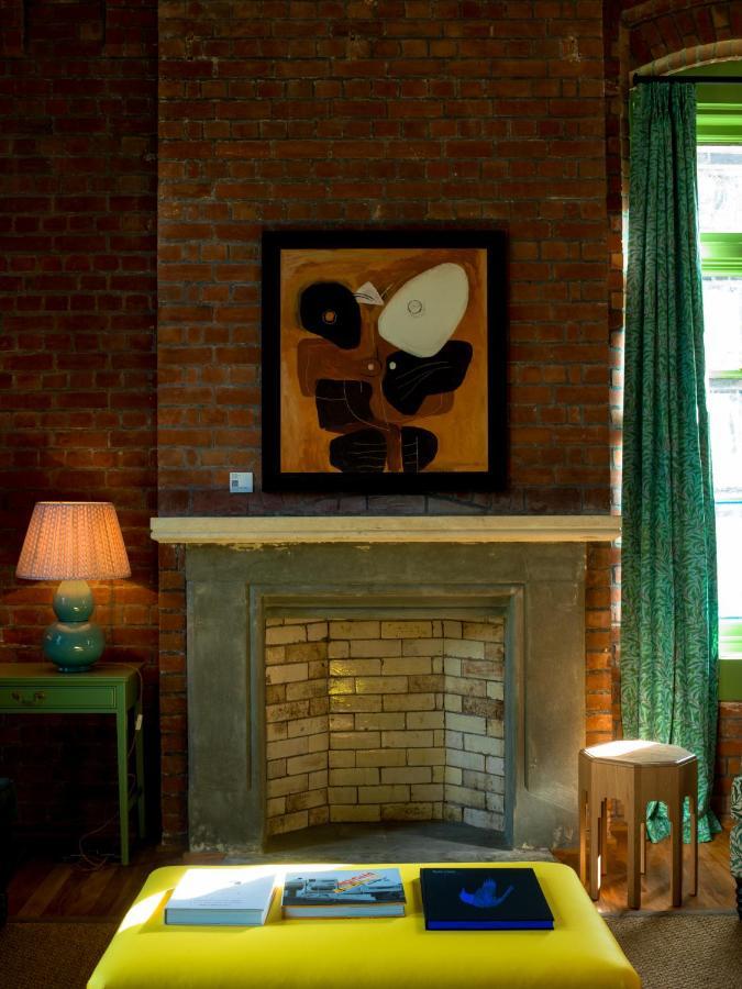 The Observatory Hotel Christchurch Extérieur photo A fireplace at the house